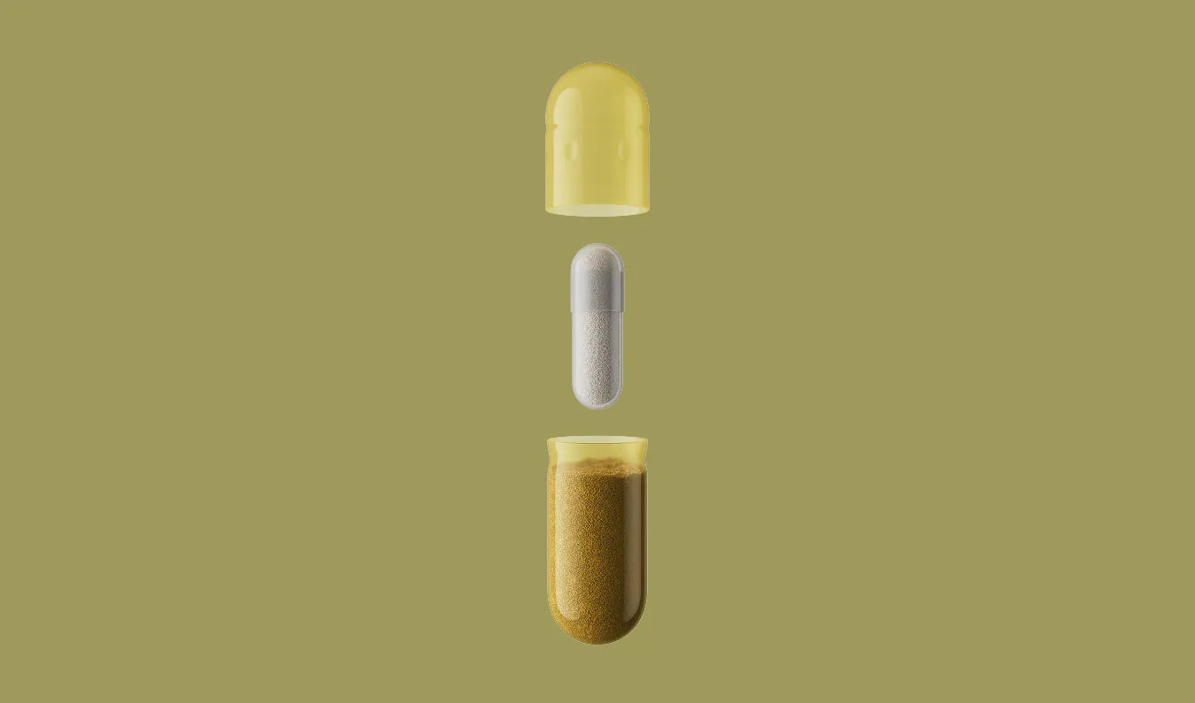 Three capsules with different contents on a yellow background